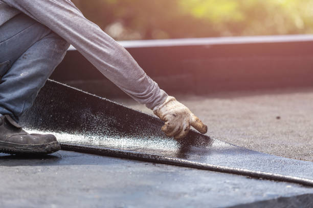 Professional Basement Waterproofing technician working in Marshall, MN